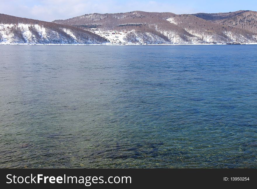 Frozen Lake Baikal. Spring. Day.