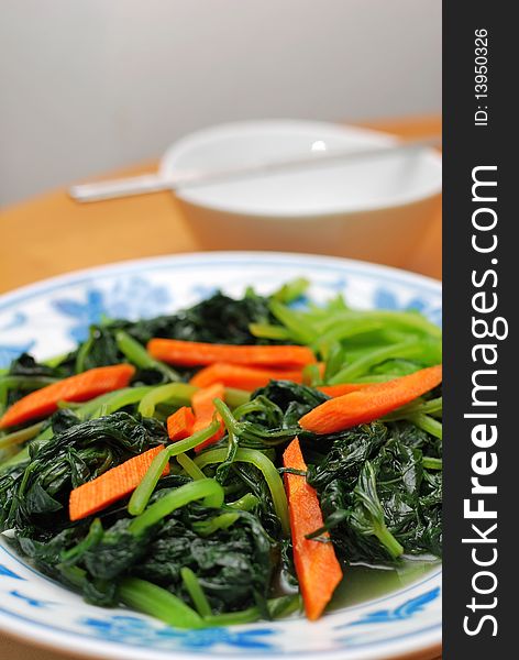 Home cooked healthy Chinese leafy vegetables. Suitable for food and beverage, travel, healthy lifestyle, and diet and nutrition. Home cooked healthy Chinese leafy vegetables. Suitable for food and beverage, travel, healthy lifestyle, and diet and nutrition.