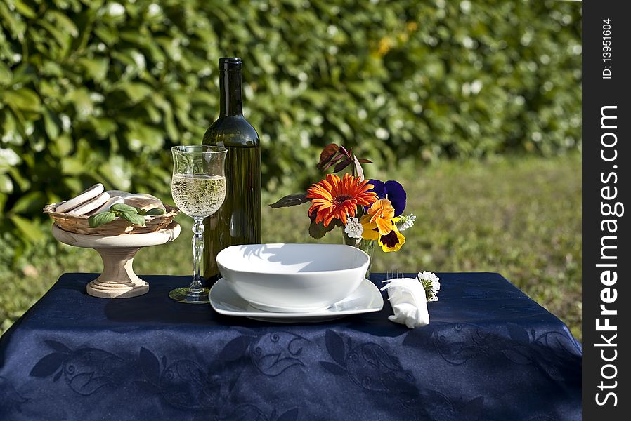 Picnic table in a garden on a sunny day