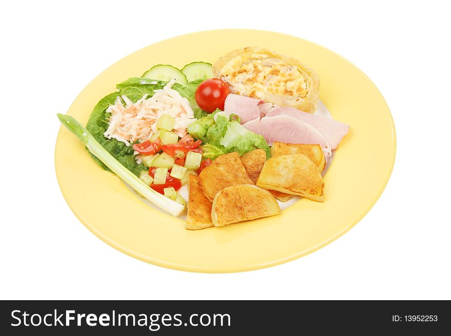 Ham and quiche salad with fried potatoes on a plate