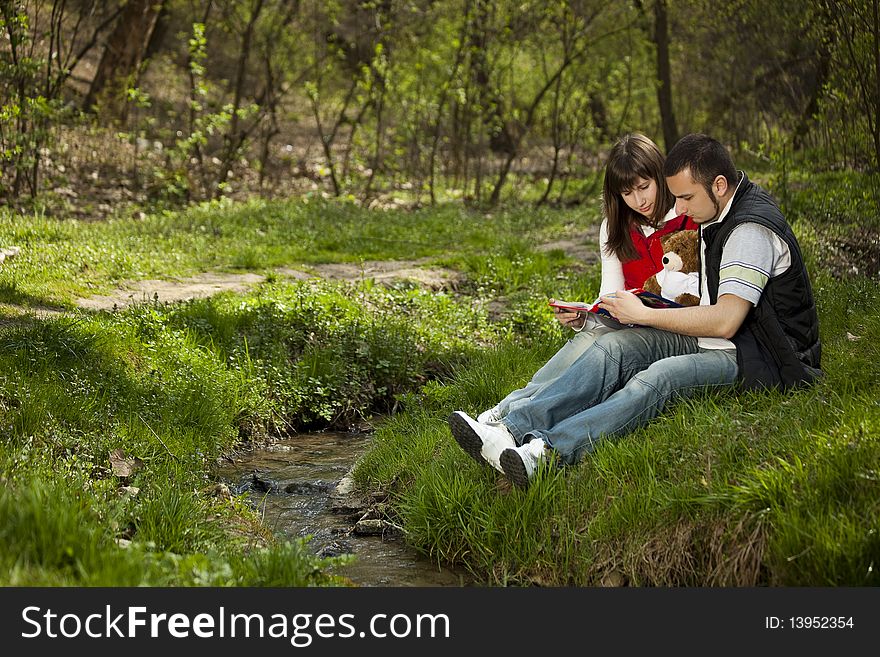 Young Couple In A Forest