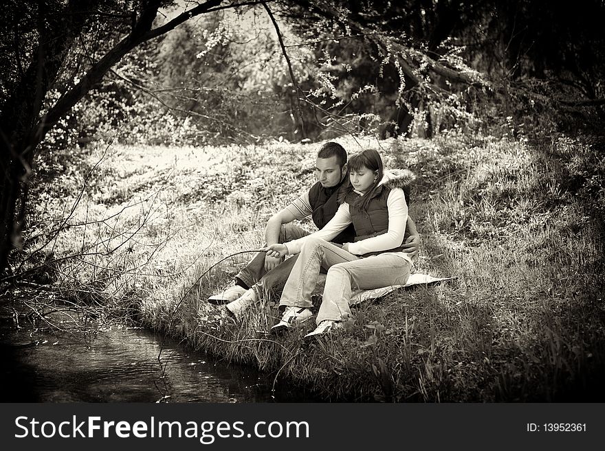 Young Couple In A Forest