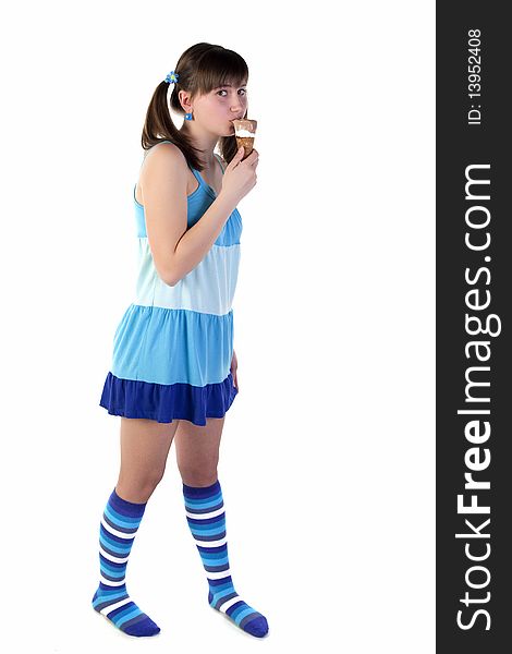 Young lady holding ice cream in a blue dress. Young lady holding ice cream in a blue dress