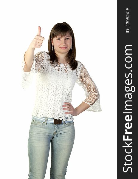 Teenage girl with thumb up on a white background. Teenage girl with thumb up on a white background