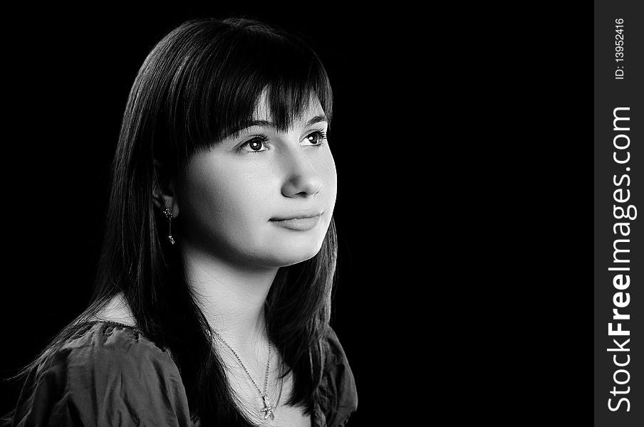 Beautiful girl looking away in black and white image. Beautiful girl looking away in black and white image