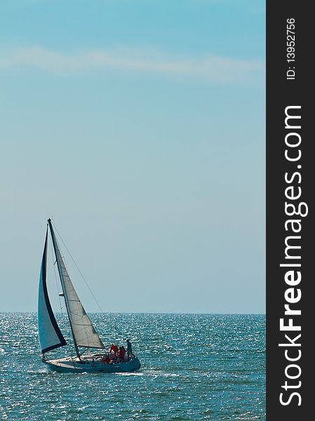 Solitary sailboat at sea on Pacific Ocean. Solitary sailboat at sea on Pacific Ocean.