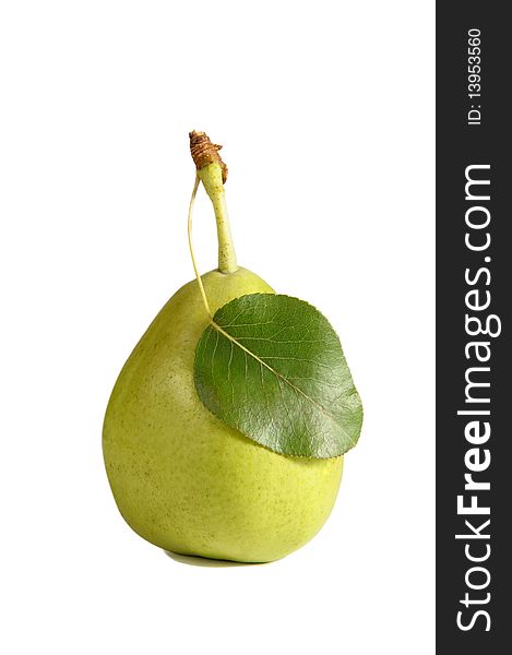 Ripe fresh yellow pear with leaf isolated on white