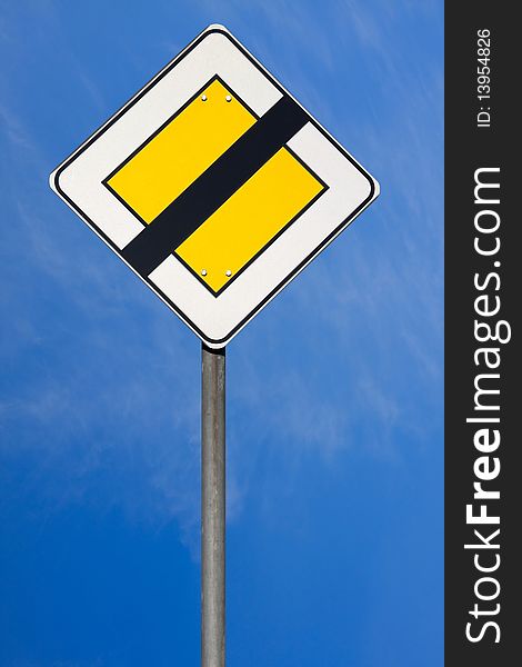 Road sign  on blu sky background