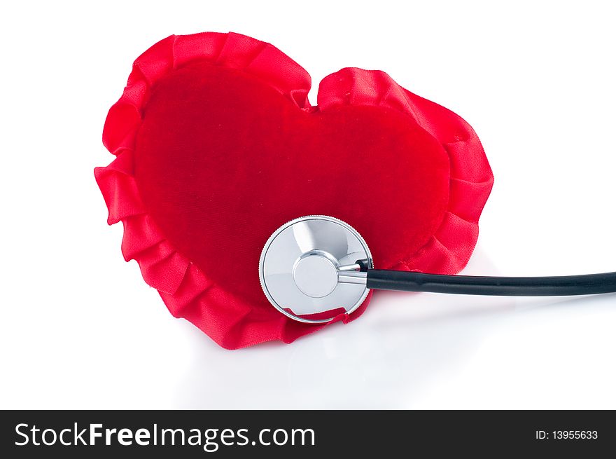 Red heart and stethoscope isolated on white background