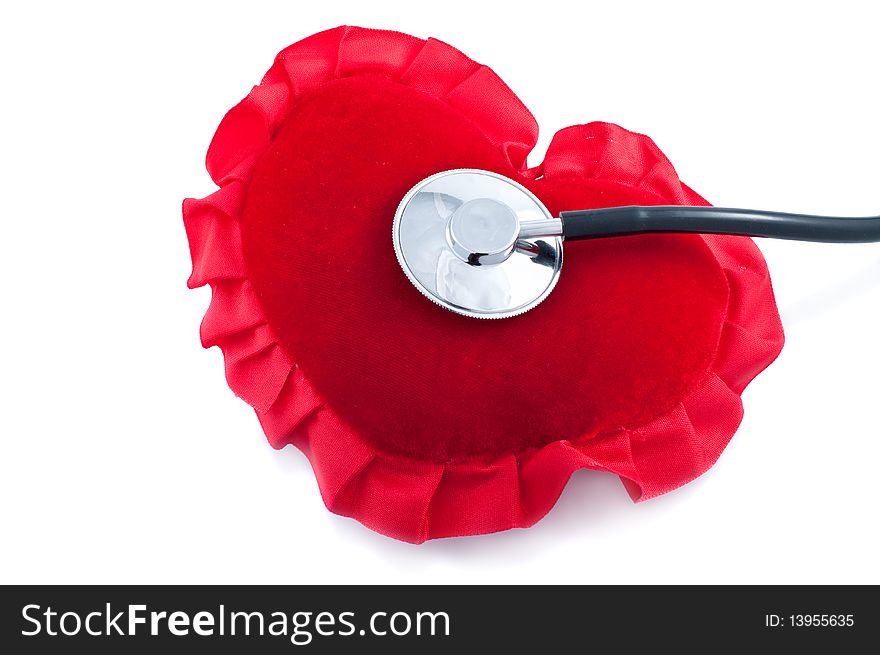 Red heart and stethoscope isolated on  white background