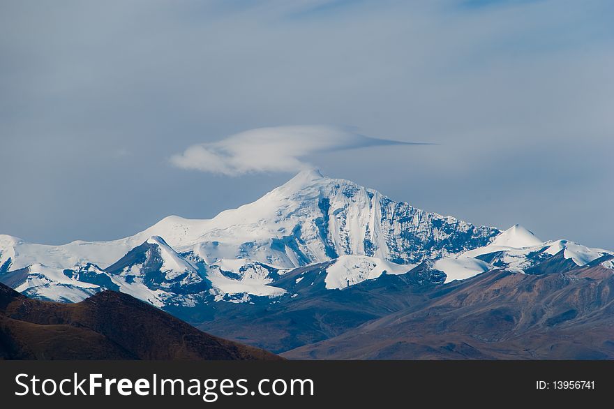 Scenery of mountains and clouds in Tibet looks like a dragoon. Scenery of mountains and clouds in Tibet looks like a dragoon