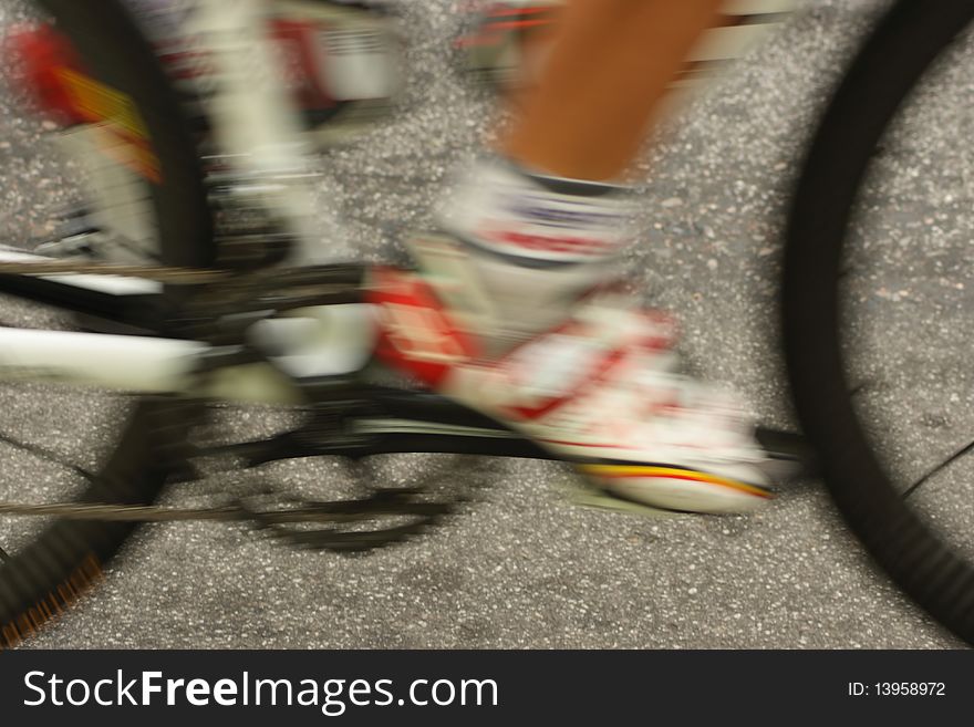 Blurred feet of cyclist, concept of speed