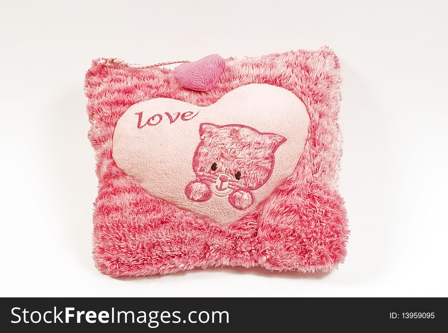 Pinkish love pillow isolated on white background