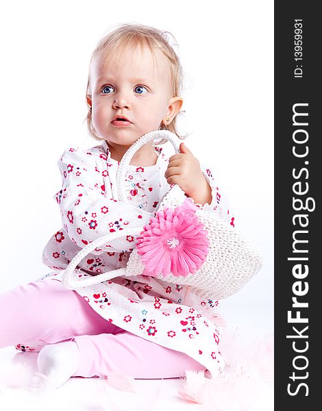 Sweet happy little girl sit over white background