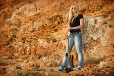 The Beautiful Blonde With A Guitar Royalty Free Stock Photos