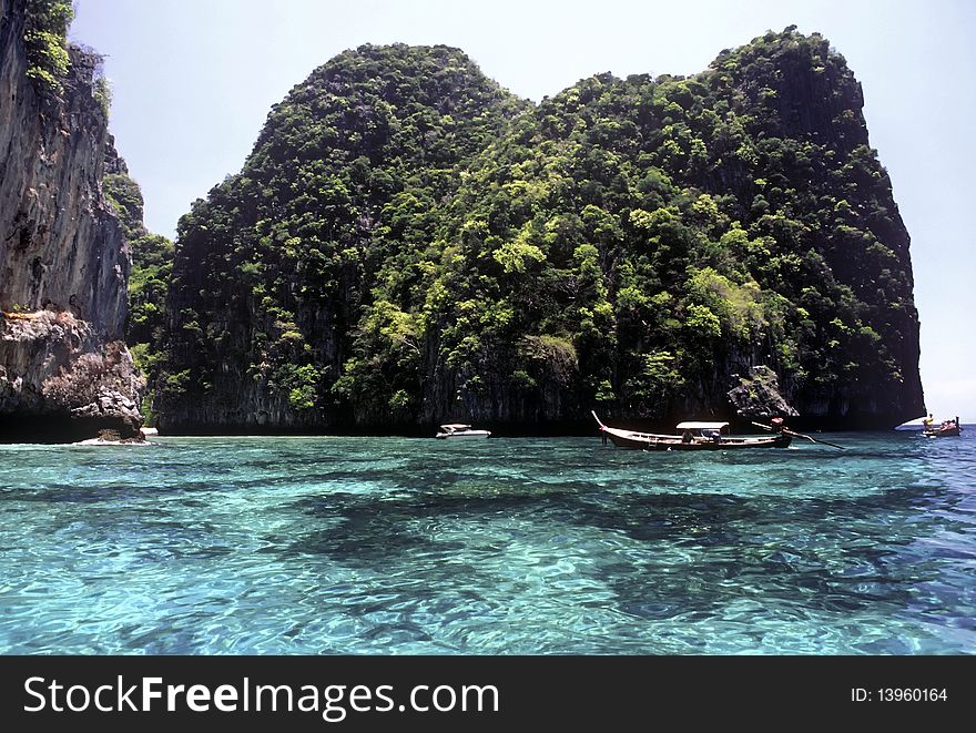 Crystal-clear water near the Island of Ko Phi Le, Thailand. Crystal-clear water near the Island of Ko Phi Le, Thailand