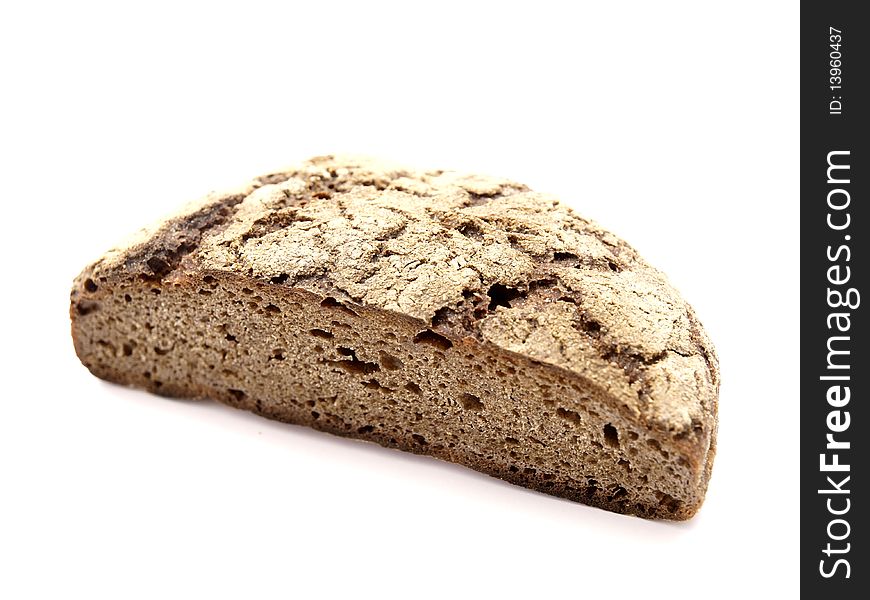 A half rye bread on a white background