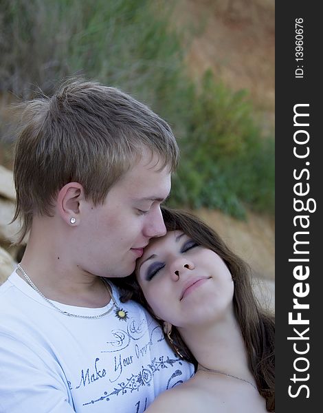 Man and woman enjoying themselves on the beach. Man and woman enjoying themselves on the beach