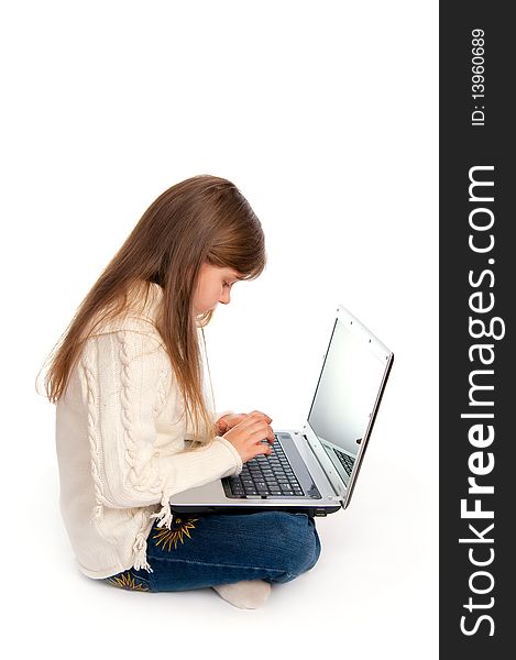 The Sitting Little Girl With The Laptop