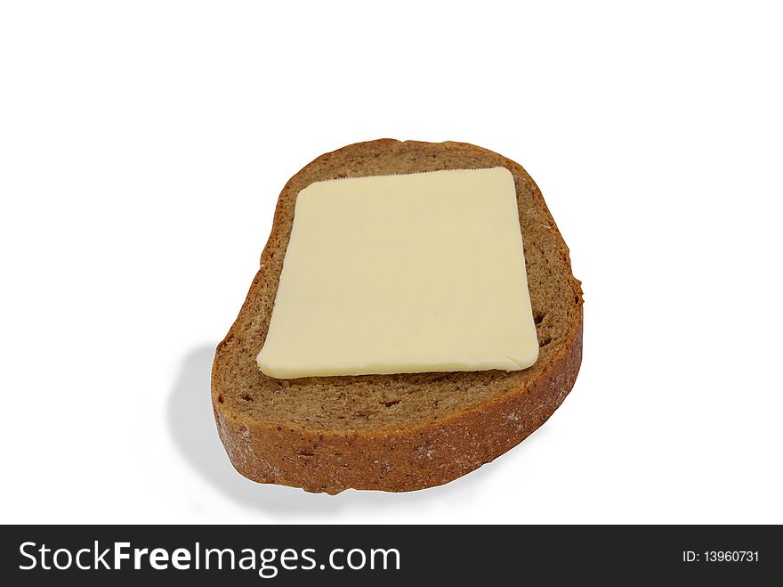 Black bread and butter on a white background