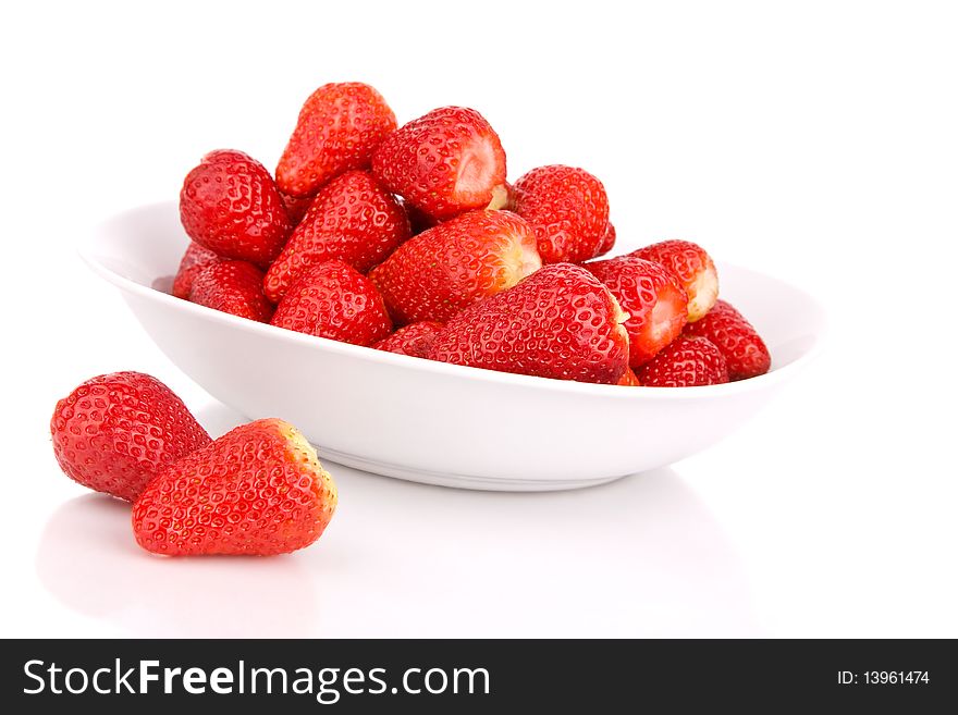 Strawberries in a bowl isolated