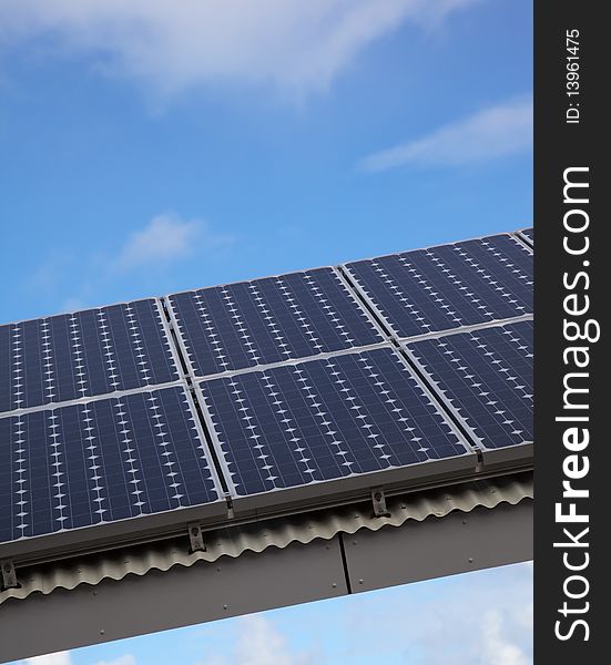 Solar Panel Against Blue Sky with clouds