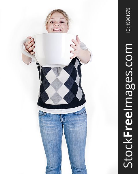 The beautiful young woman holding big coffee cup