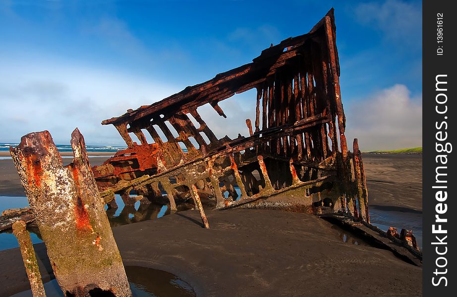 Rust remains of the bow area of the Peter Iredale. Rust remains of the bow area of the Peter Iredale