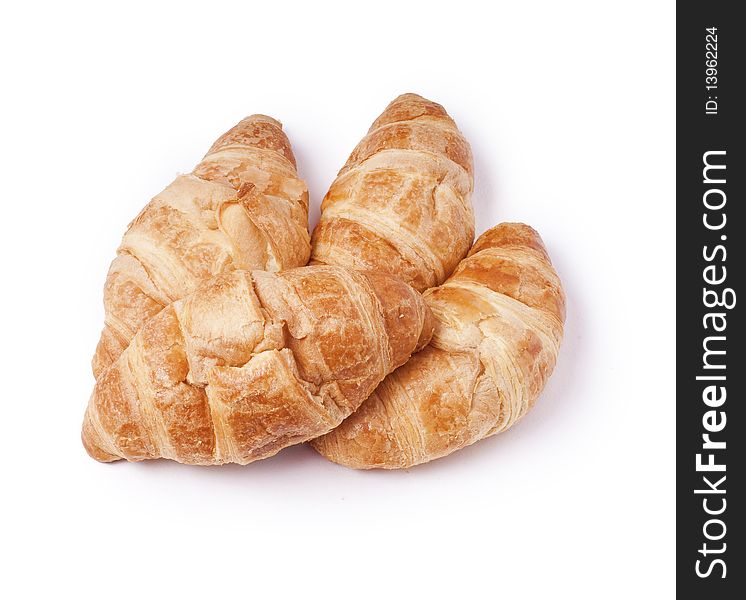 Fresh croissants, isolated on white background