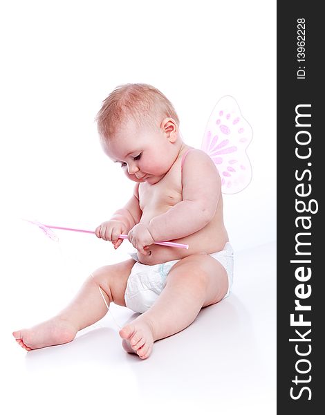 Little baby sitting on white background