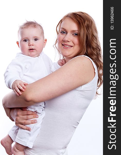 Portrait of baby and her mother on white background