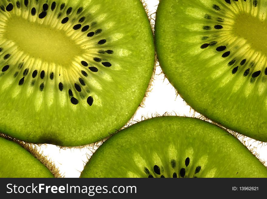 Kiwi fruit over a white background
