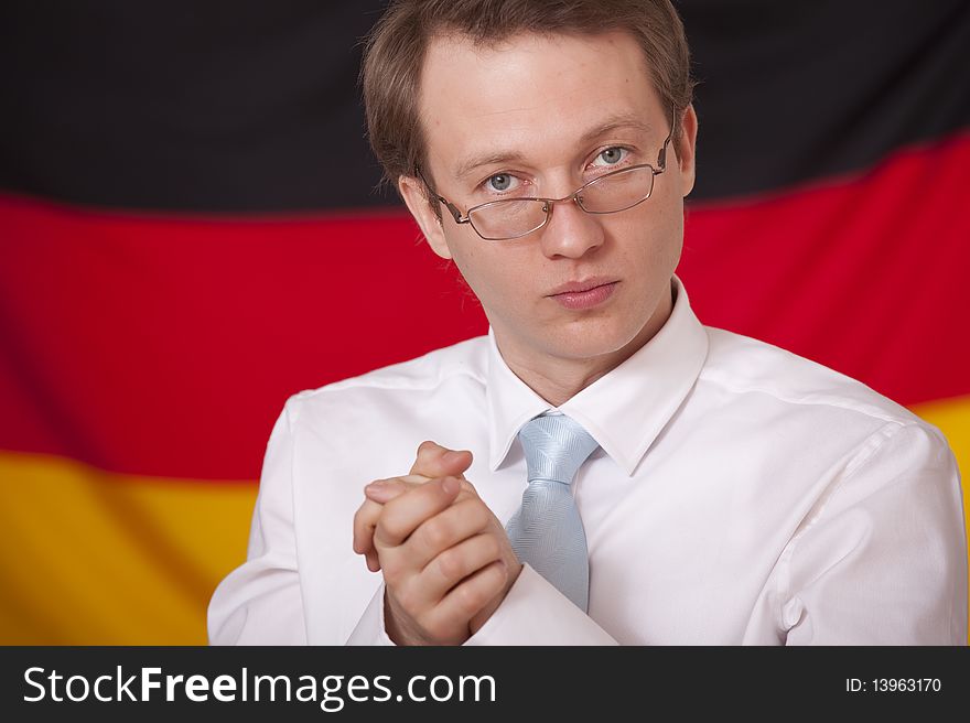 Economic cohesion - businessman in front of a german flag