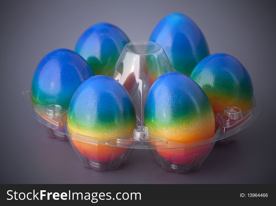 Colorful easter eggs in a plastic basket. Colorful easter eggs in a plastic basket