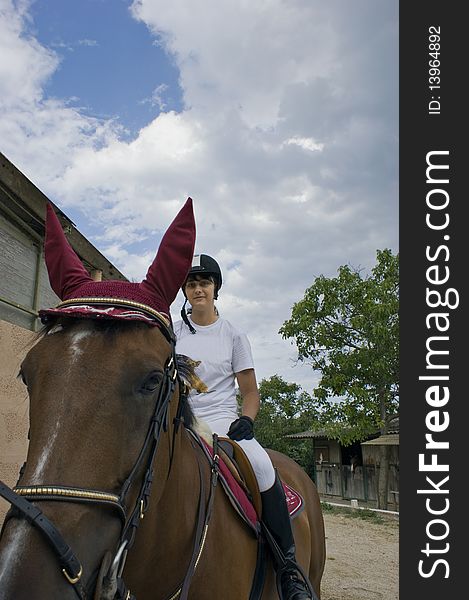 Girl riding horse