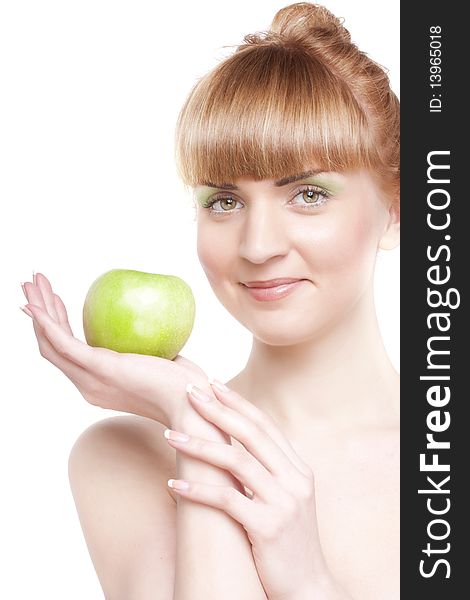 Beautiful smiling girl with green apple