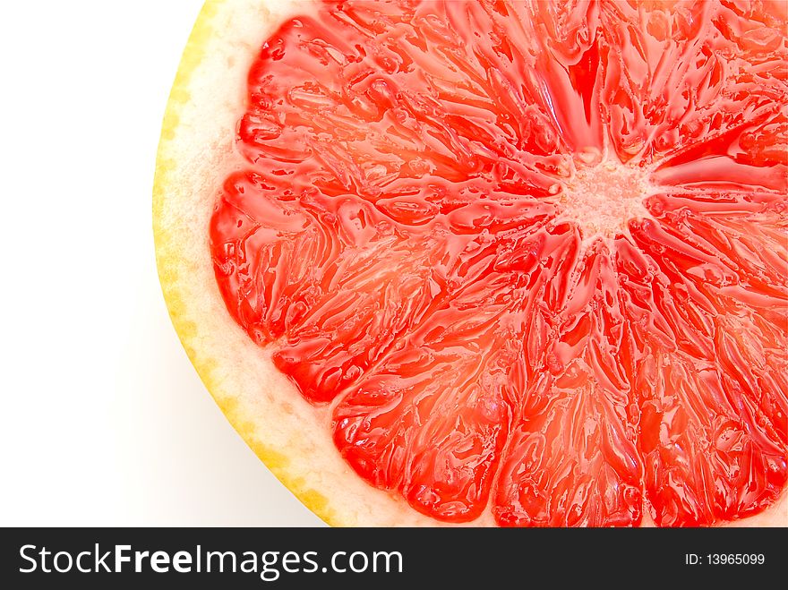 Close up of juicy citrus fruit slice. Close up of juicy citrus fruit slice