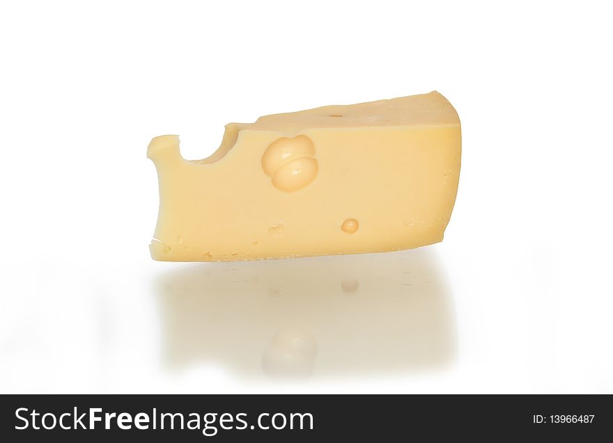 A cheese isolated on a white background. Clipping path is included. A cheese isolated on a white background. Clipping path is included