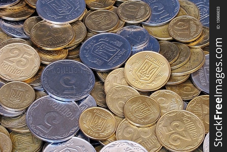 Heap of different ukrainian coins