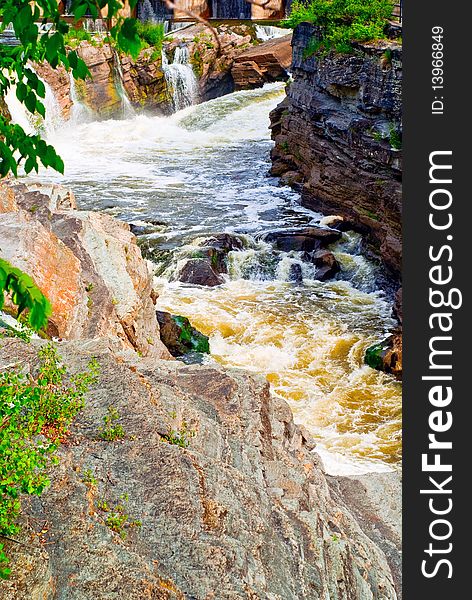 Rushing Rapids Cutting Through Rock