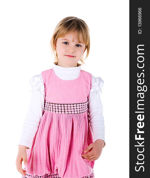 Cute little girl in a pink. Studio shot