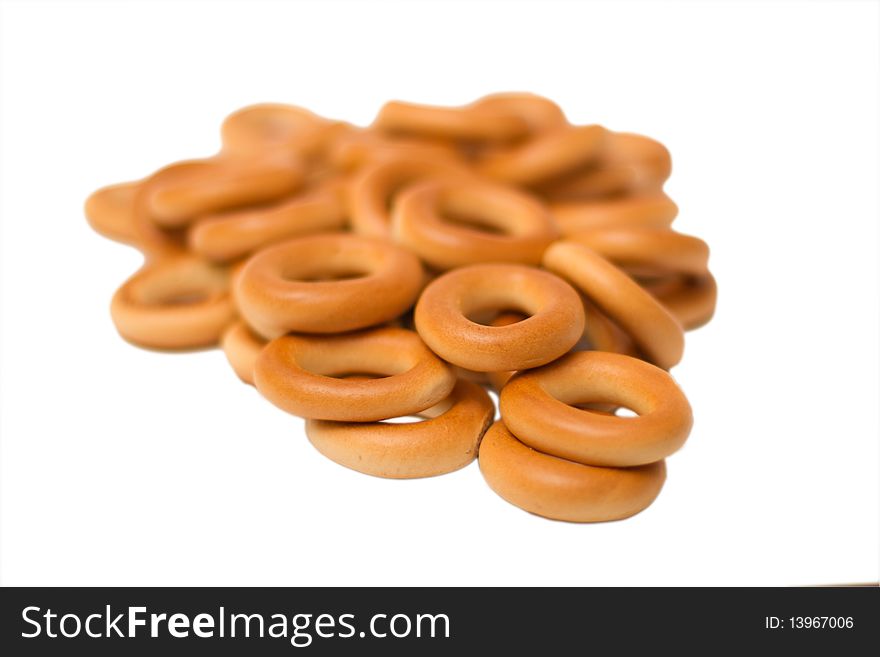 A pile of bagels isolated in white. A pile of bagels isolated in white.