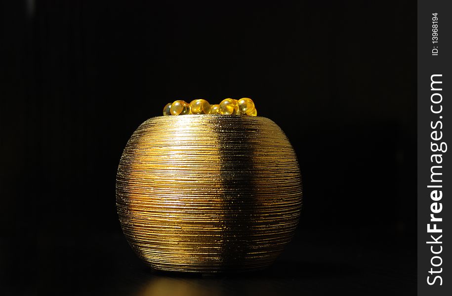 Round candle candleholder bronze, golden, isolated on black