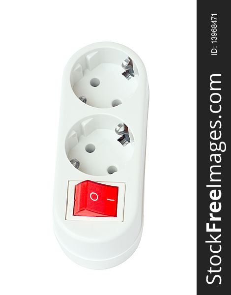 An electric socket - a splitter with a switch, isolated on a white background. An electric socket - a splitter with a switch, isolated on a white background.