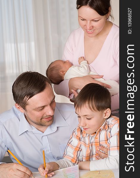 Couple With Two Children Resting