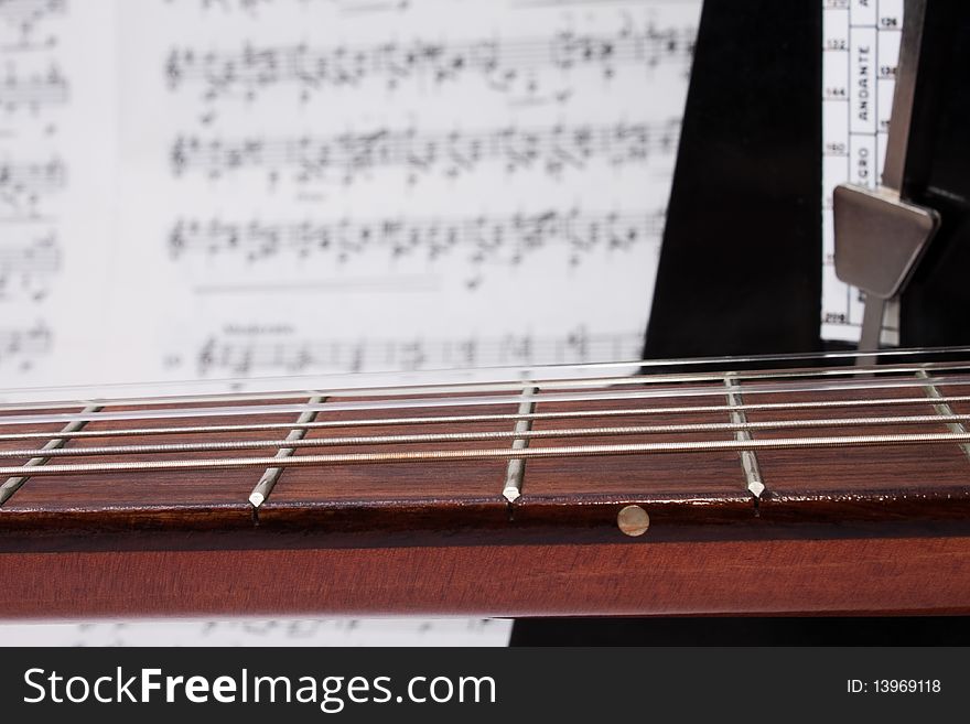 Closeup Guitar Neck, Notes and Metronome