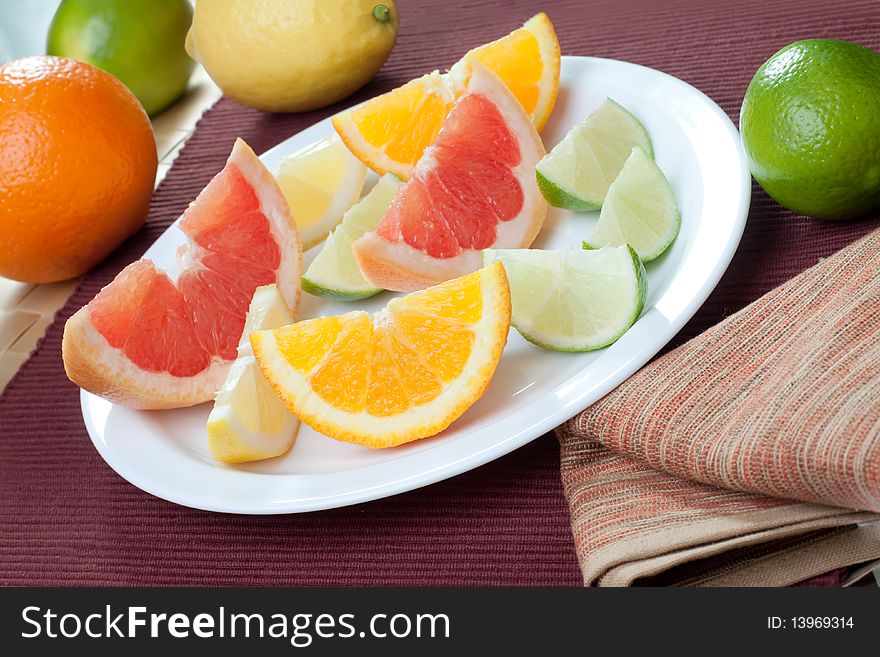 Arrangement of lemon, lime, tangerine, orange and grapefruit fruit. Arrangement of lemon, lime, tangerine, orange and grapefruit fruit