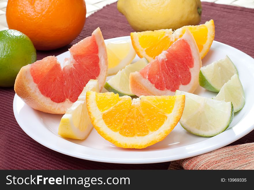 Arrangement of lemon, lime, tangerine, orange and grapefruit fruit. Arrangement of lemon, lime, tangerine, orange and grapefruit fruit