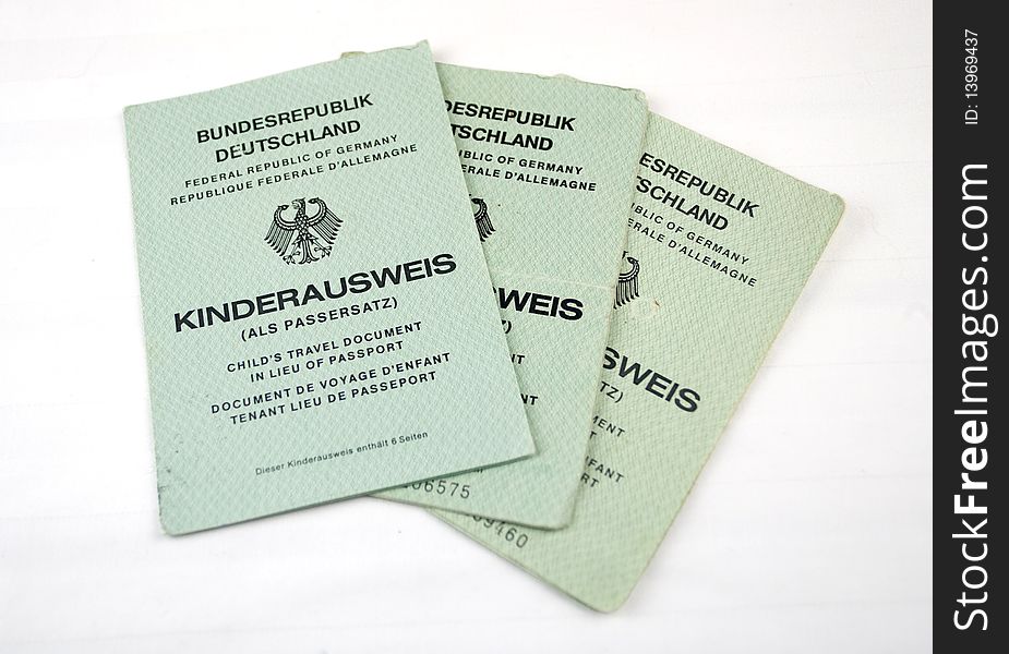 Image of three childrens passports from Gemnay.