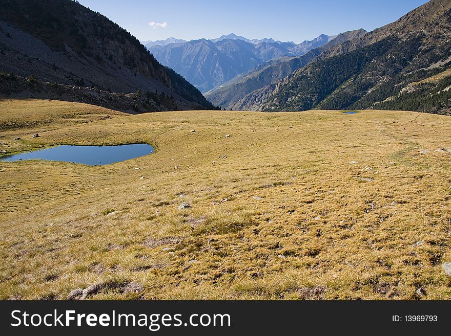 View from pass Rus in Aiguestortes and Estany de Sant Maurici National Park. Spain - Pyrenees. View from pass Rus in Aiguestortes and Estany de Sant Maurici National Park. Spain - Pyrenees.